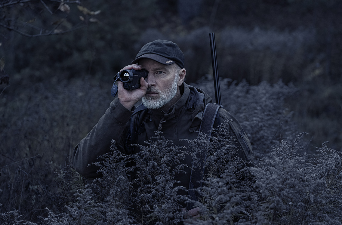 Pulsar Axion 2 XG35 Thermal Imaging Monocular being used in a hunting situation.