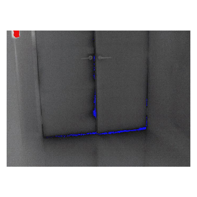 Combined visual and thermal image of a door. Blue around the seal of the door indicates heat loss.