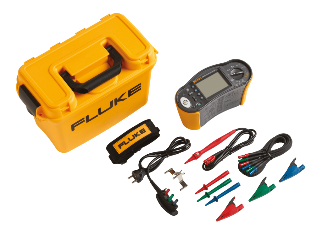 Image of a Fluke 1660 MFT and supplied accessories including a yellow, Fluke-branded hard case, neck strap, test leads, crocodile clips (red, green, and blue), test probes (red, green, and blue), and a mains cord. 