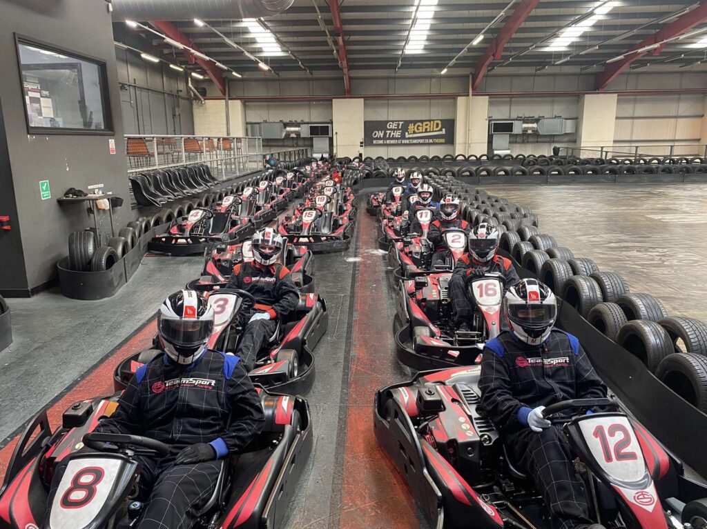 The calibration department line up in their go-karts at the beginning of the race. 