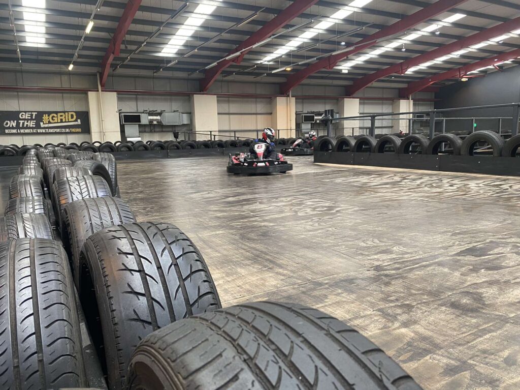 One member of the calibration team comes round the corner in their go-kart. 