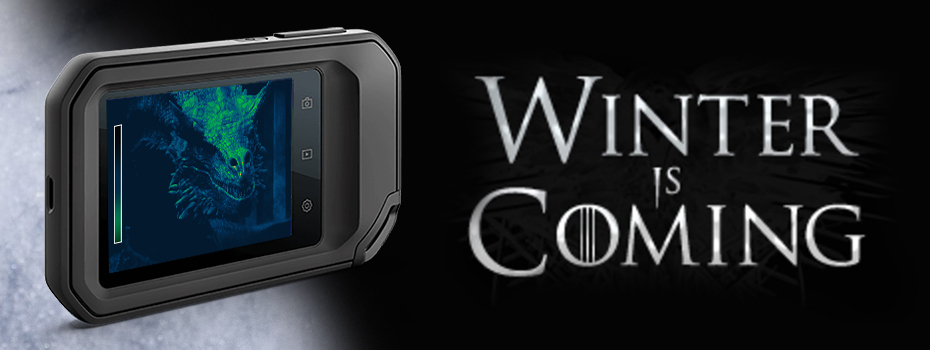 On the right large, grey text in the Game of Thrones font reads "Winter Is Coming". The text sits on a black background. To the left a  FLIR C5 stands on some snow. On the screen is a thermal image of a dragon. 