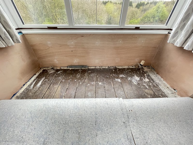 Digital image of the inside of a bay window after it had been re-insulated. 