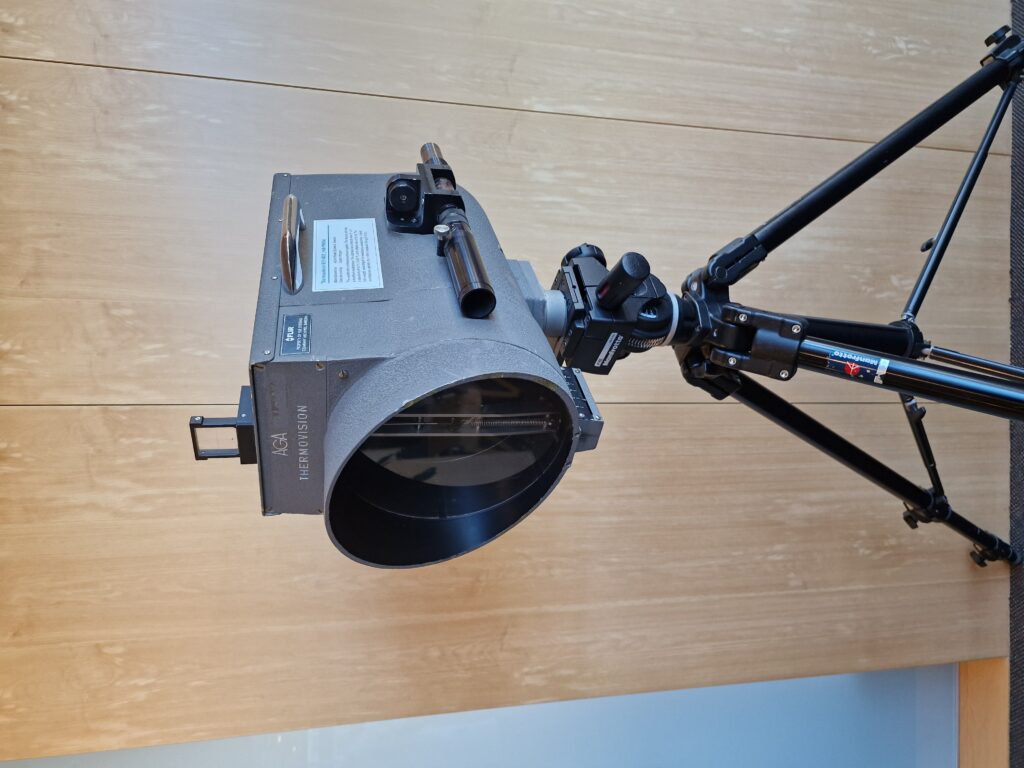 An early Teledyne camera model on a tripod. 