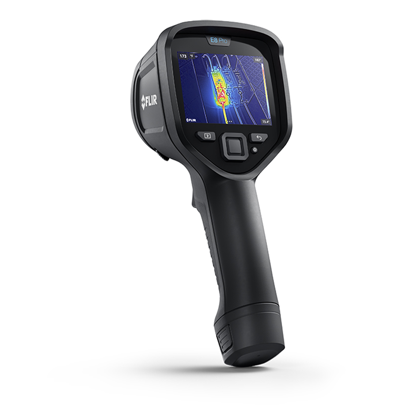 Teledyne FLIR E8 Pro Thermal Camera. It is angled towards the left with the display facing the viewer. Upon the screen is a thermal image. 