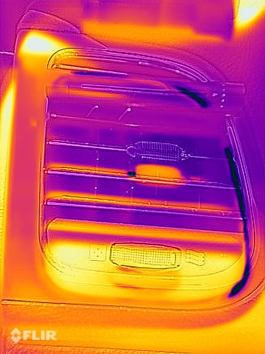 Thermal image of a vehicle AC vent. Yellow patches at the bottom indicate heat and, therefore, a fault. 