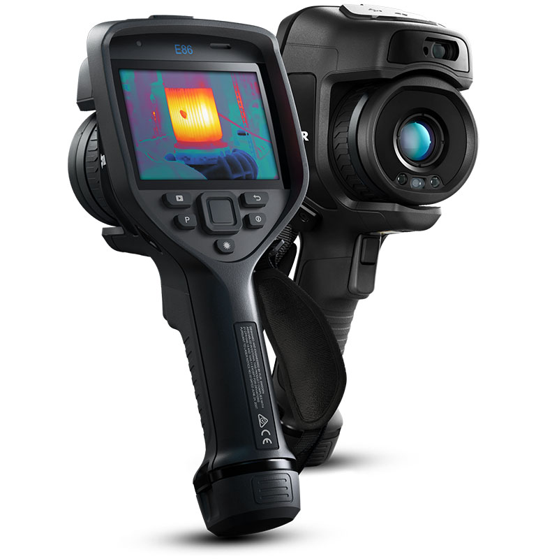 Two Teledyne FLIR E86 Thermal Cameras. One faces forwards and one faces backwards. A thermal image is visible on the display. 