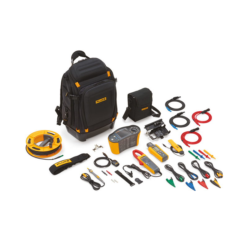 The contents of the Fluke SMFT-1000 Solar Multifunction PV Tester - Standard Kit is laid out in front of a large, durable, black Fluke rucksack. 