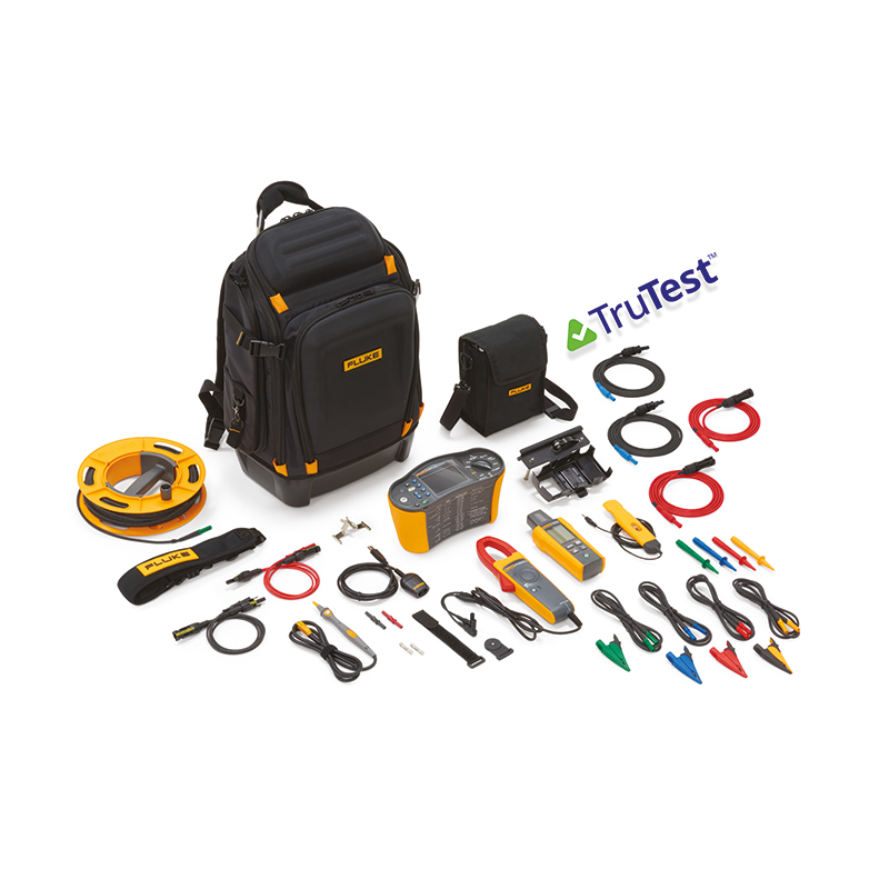 The contents of the Fluke SMFT-1000 Solar Multifunction PV Tester - Pro Kit is laid out in front of a large, durable, black Fluke rucksack. 