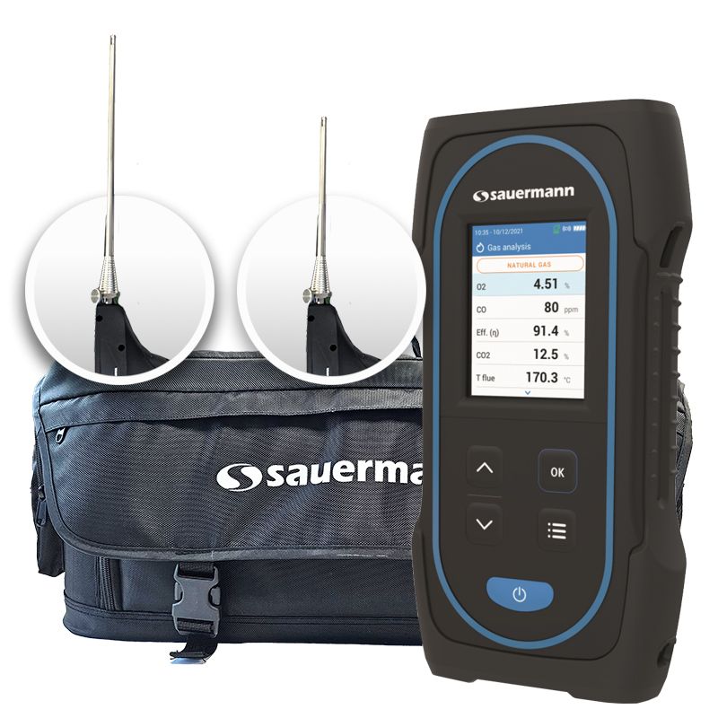 On the right stands a Sauermann Si-CA 030 Flue Gas Analyser. Behind it is a black Sauermann holdall bag. Above the bag two probe heads are displayed in circles.  