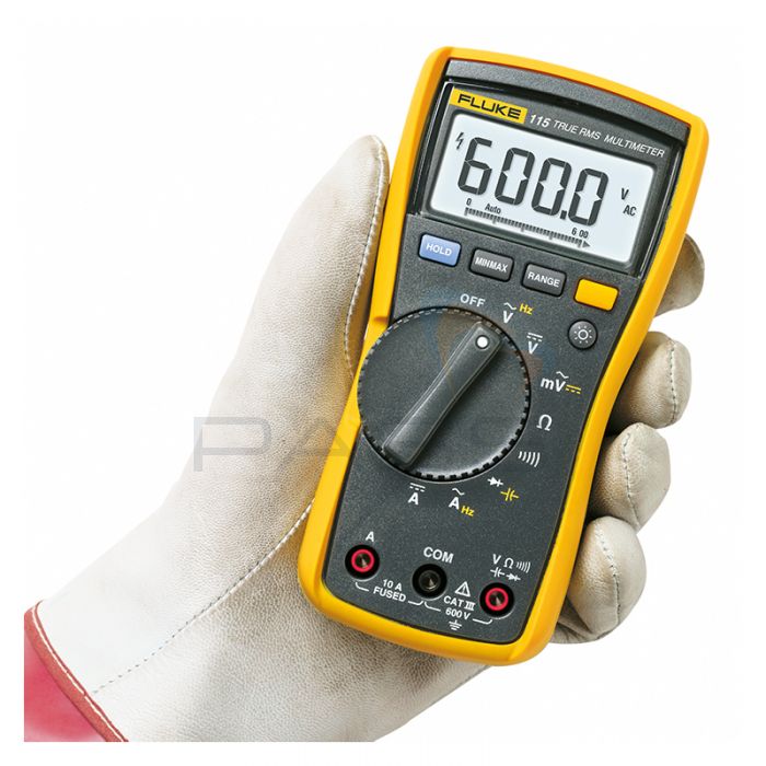 Fluke 115 Digital Multimeter in gloved hand