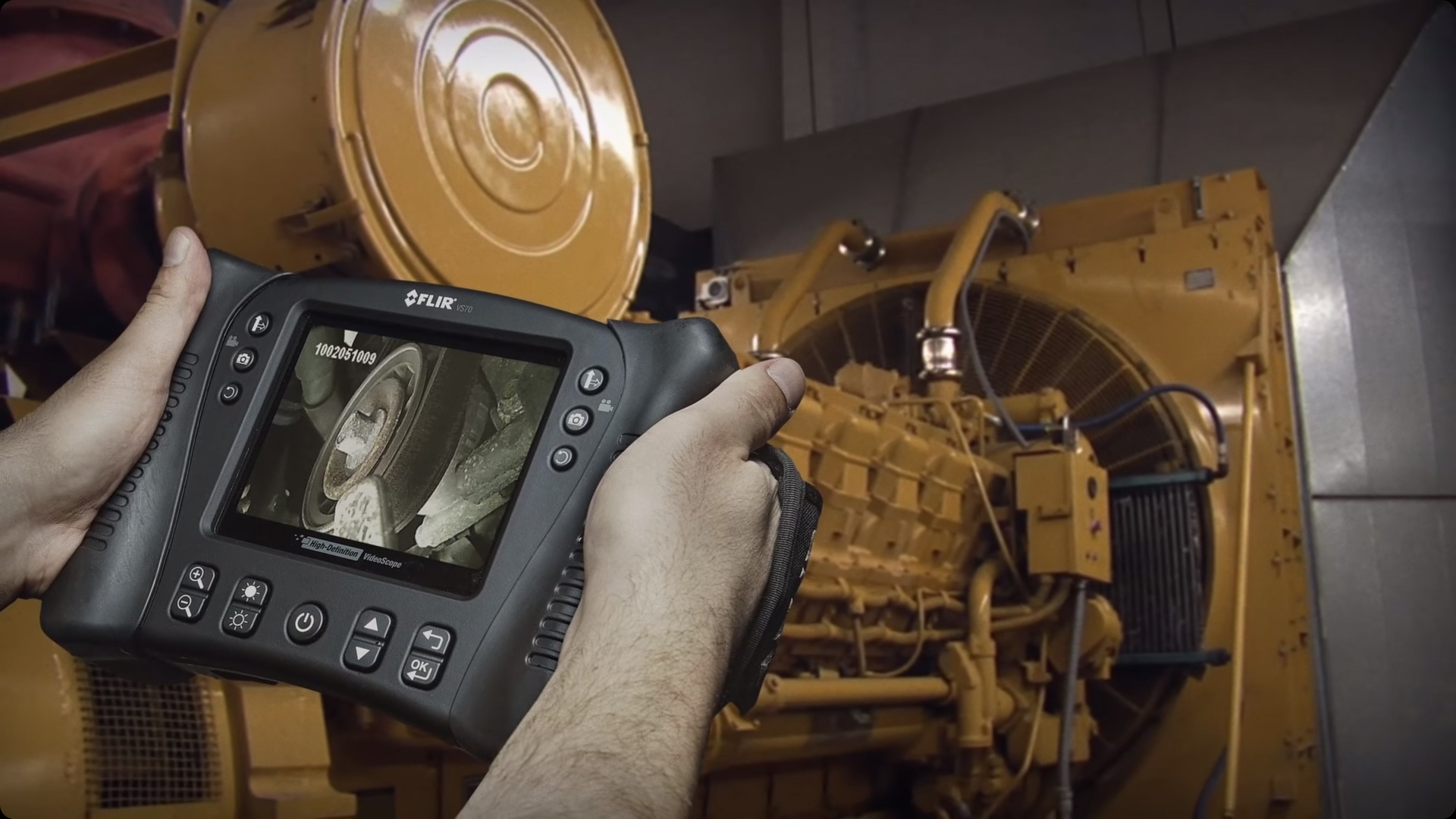 FLIR VS70 VideoScope covered in action, showing the inside of a large machine.