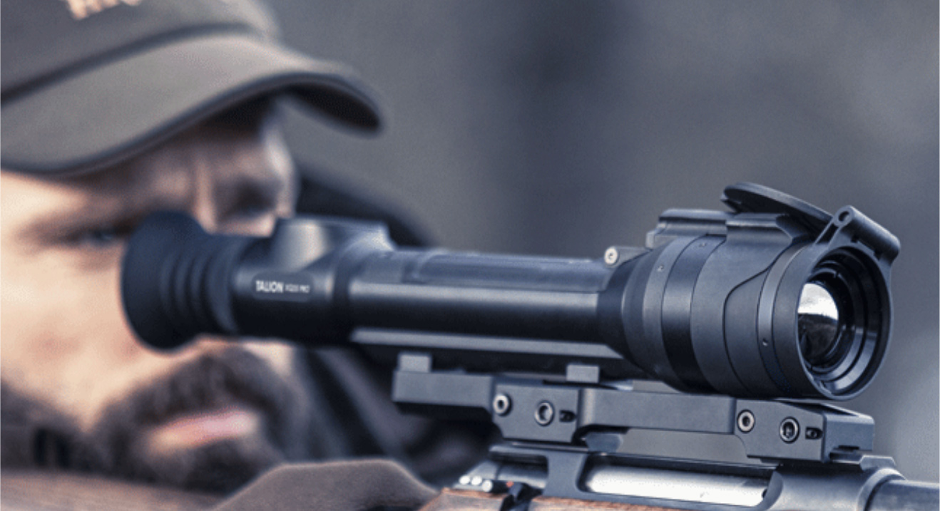 Pulsar Talion XQ35 Pro Riflescope close up of a hunter taking aim.