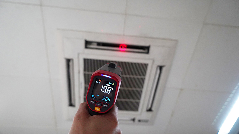 UNI-T UT303D+ Infrared Thermometer taking an air conditioning measurement